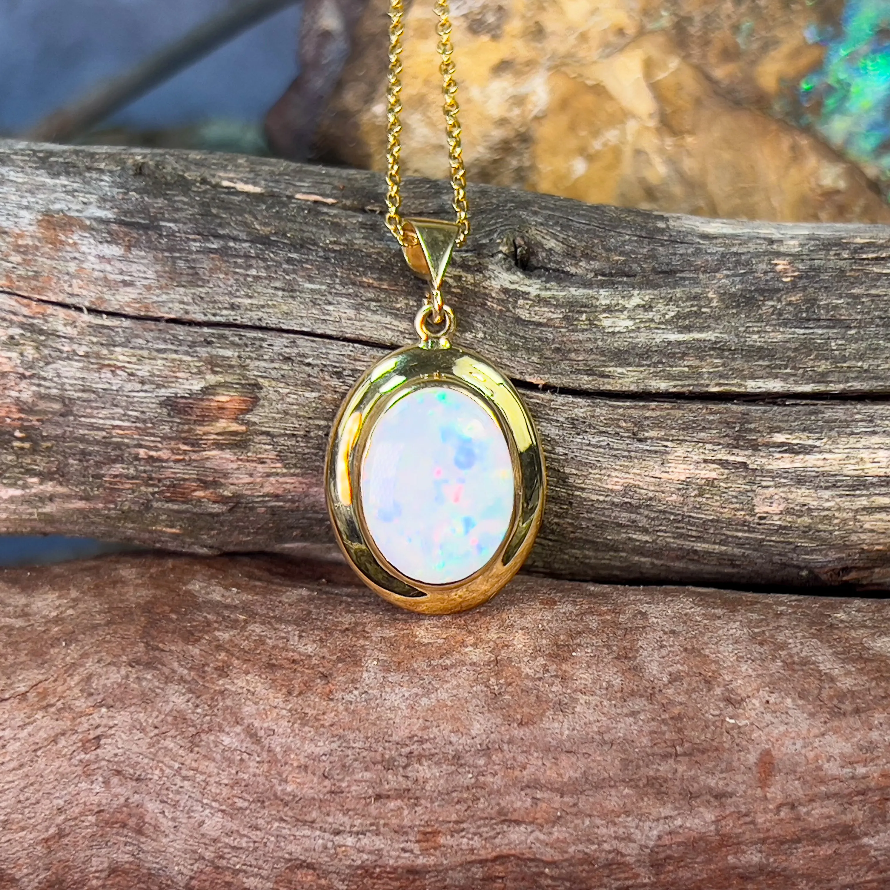 18kt Yellow Gold bezel set oval white opal 2.2ct pendant