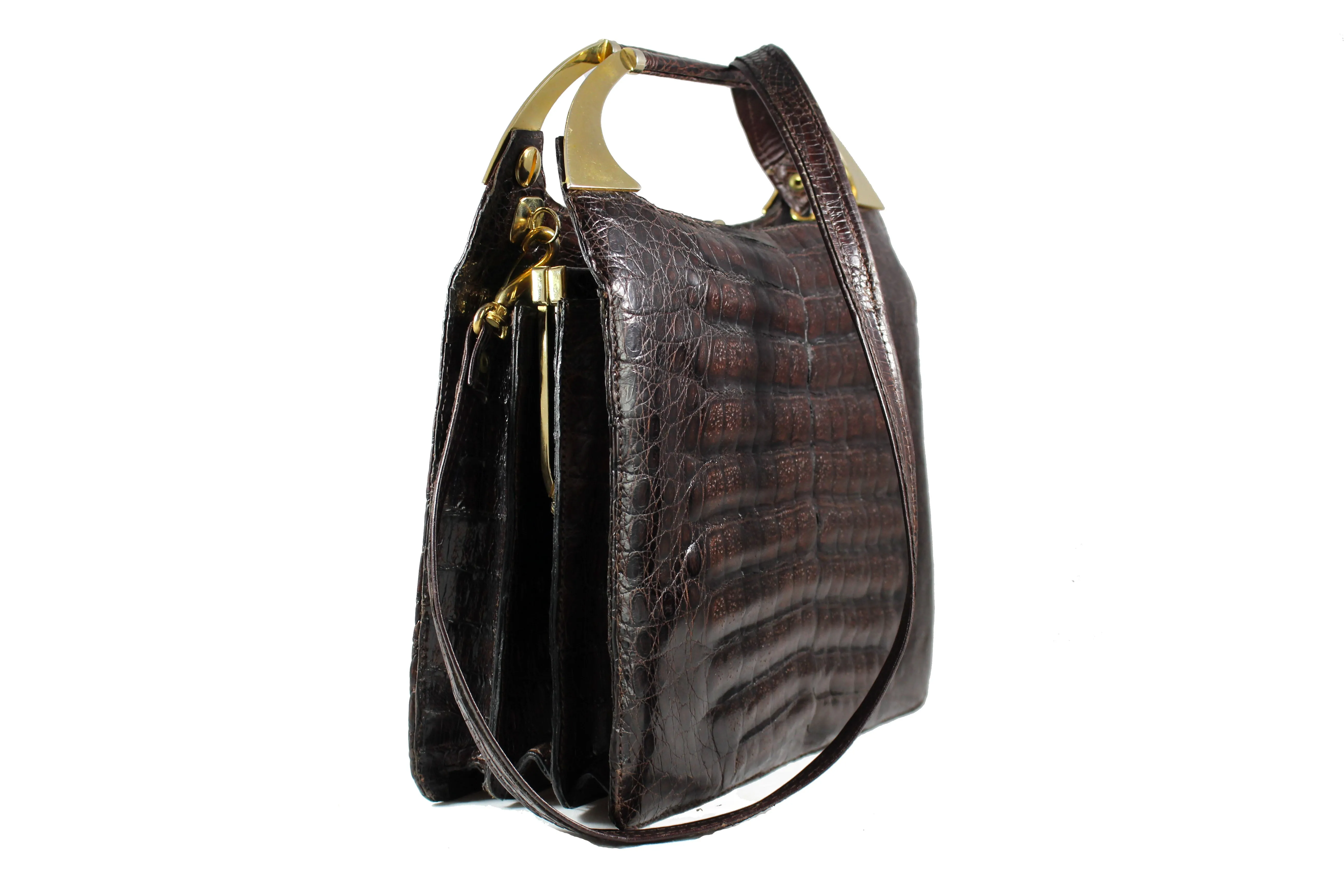 Brown crocodile skin handbag with decorative handles