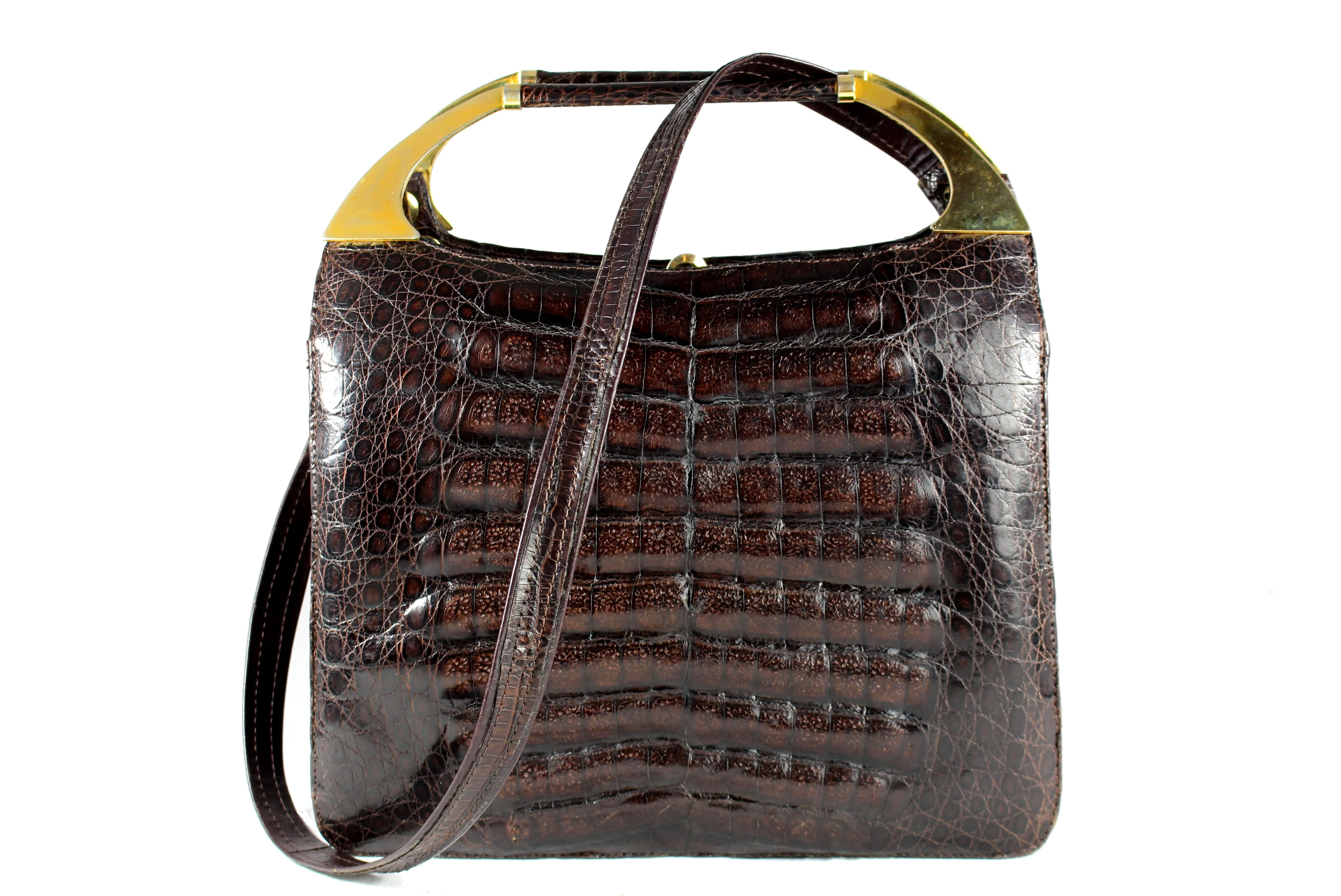 Brown crocodile skin handbag with decorative handles